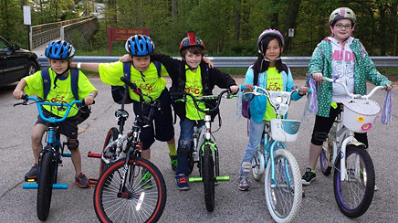 Students at Olde Creek Elementary School get ready for a bike train.